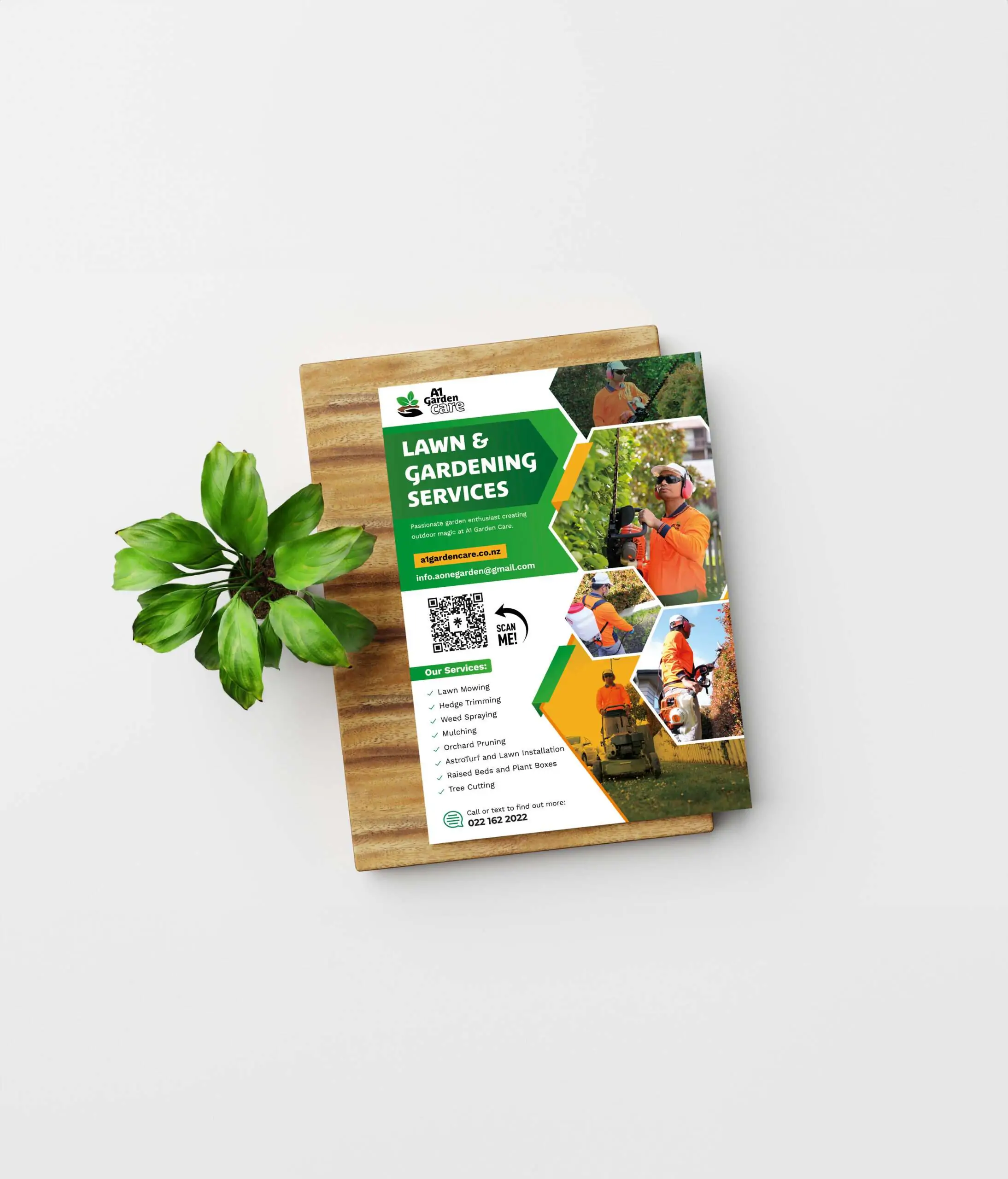 A promotional flyer for a lawn and gardening service is displayed next to a small plant on a white background. the flyer features images of gardeners at work and includes contact details and a qr code.